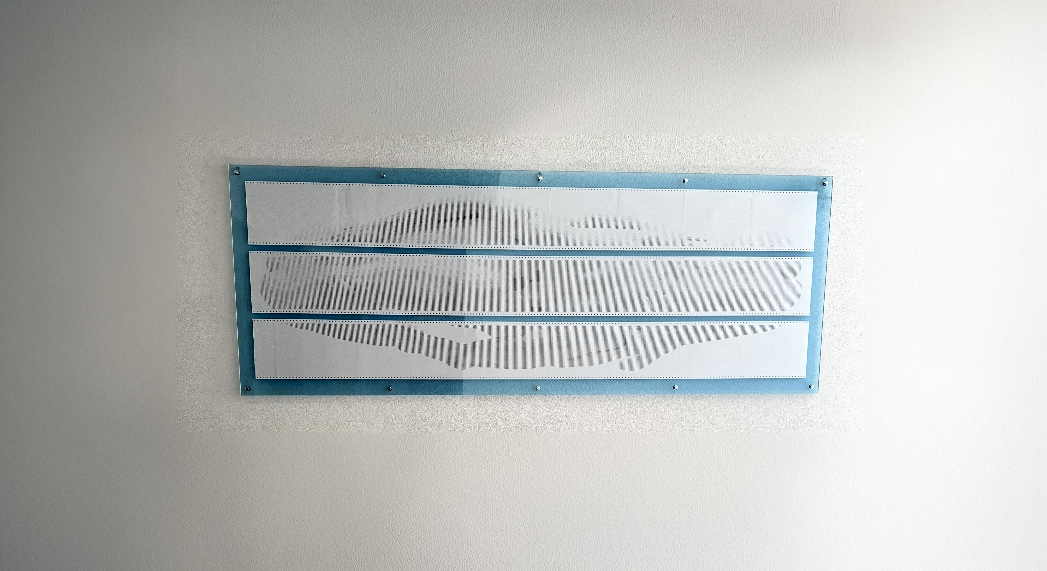 BODY.QUEUE by CHARACTERS — three-sheet ASCII scroll, 72 × 252 cm, framed and installed on wall. Dot-matrix impact print on deadstock continuous-feed paper, 2025.