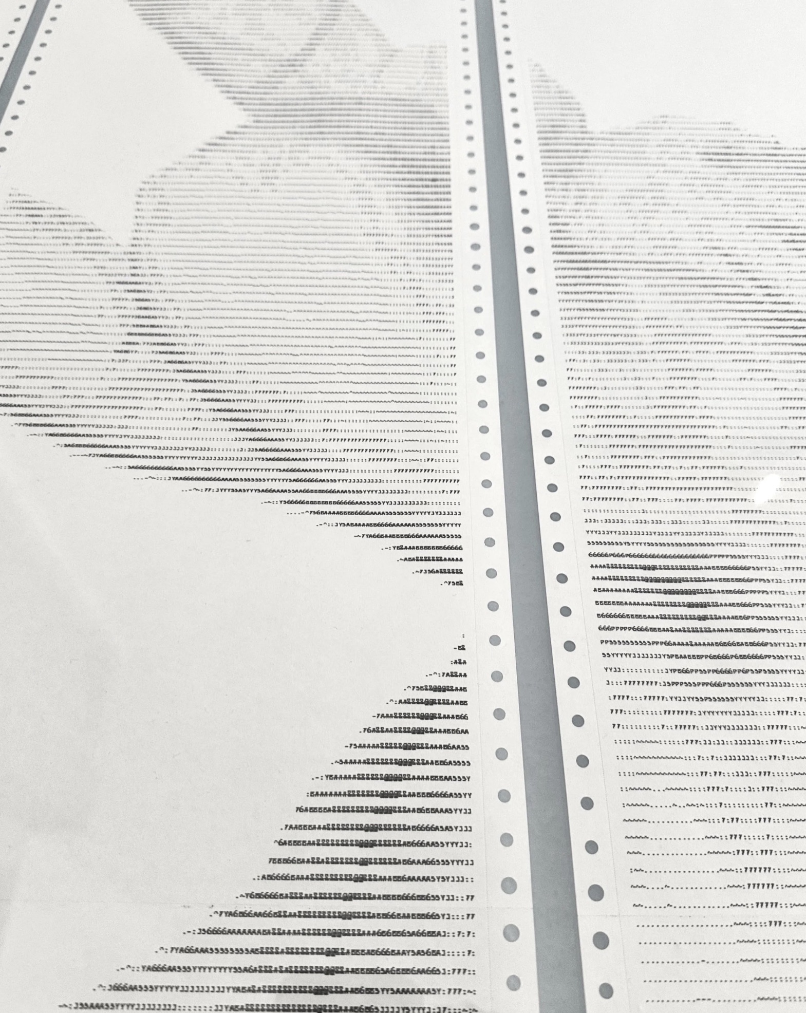 CTRL+SUB by CHARACTERS — close-up of ASCII character grid on dot-matrix paper showing one male figure striking another's face while the other grips their genitals, rendered in monospaced characters. Impact printing on deadstock continuous-feed stock.