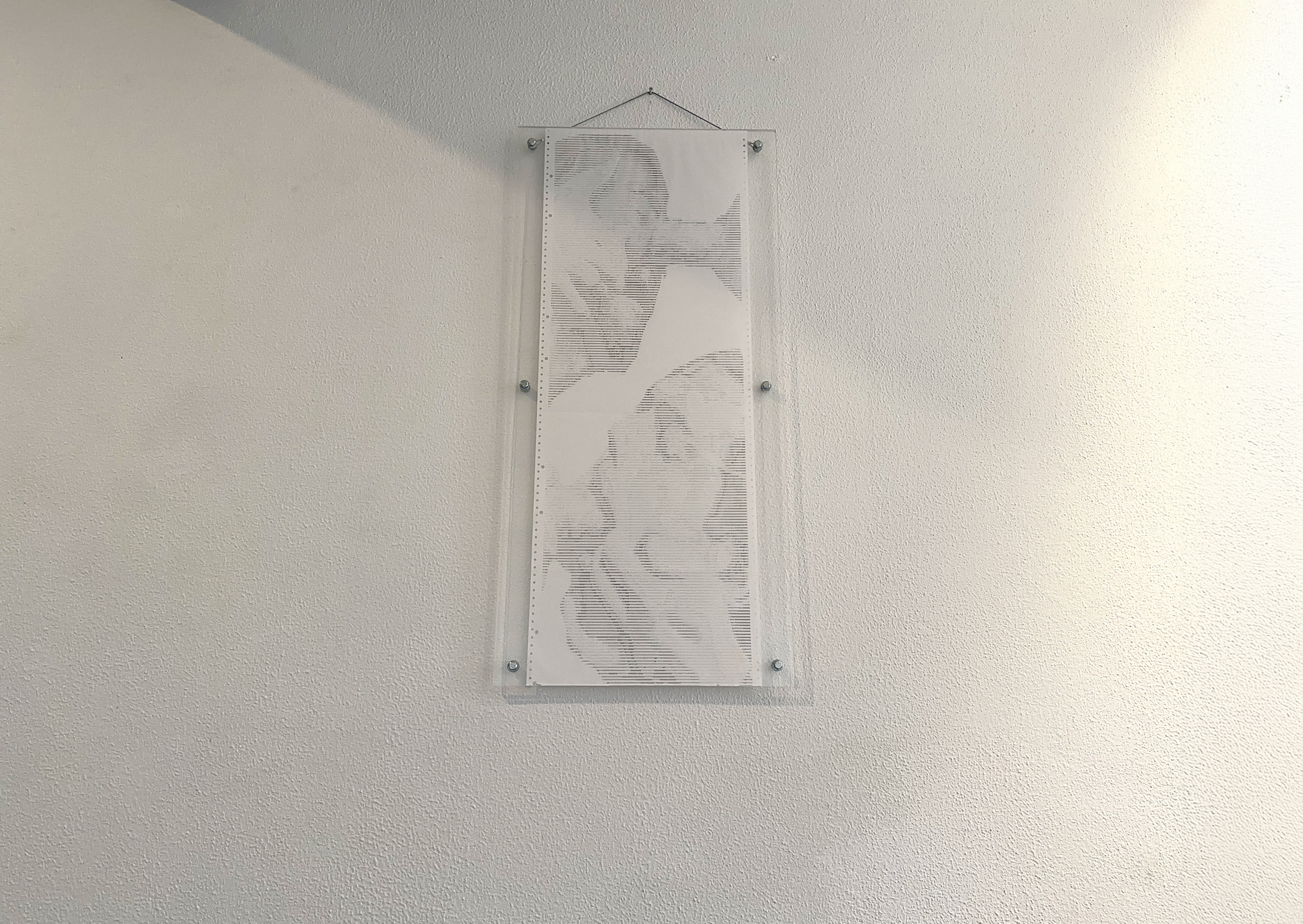 INPUT.OVERRIDE by CHARACTERS — single-sheet ASCII scroll, 38 × 102 cm, framed and installed on wall. Dot-matrix impact print on salvaged continuous-feed paper. Origin work of the practice. 2022.