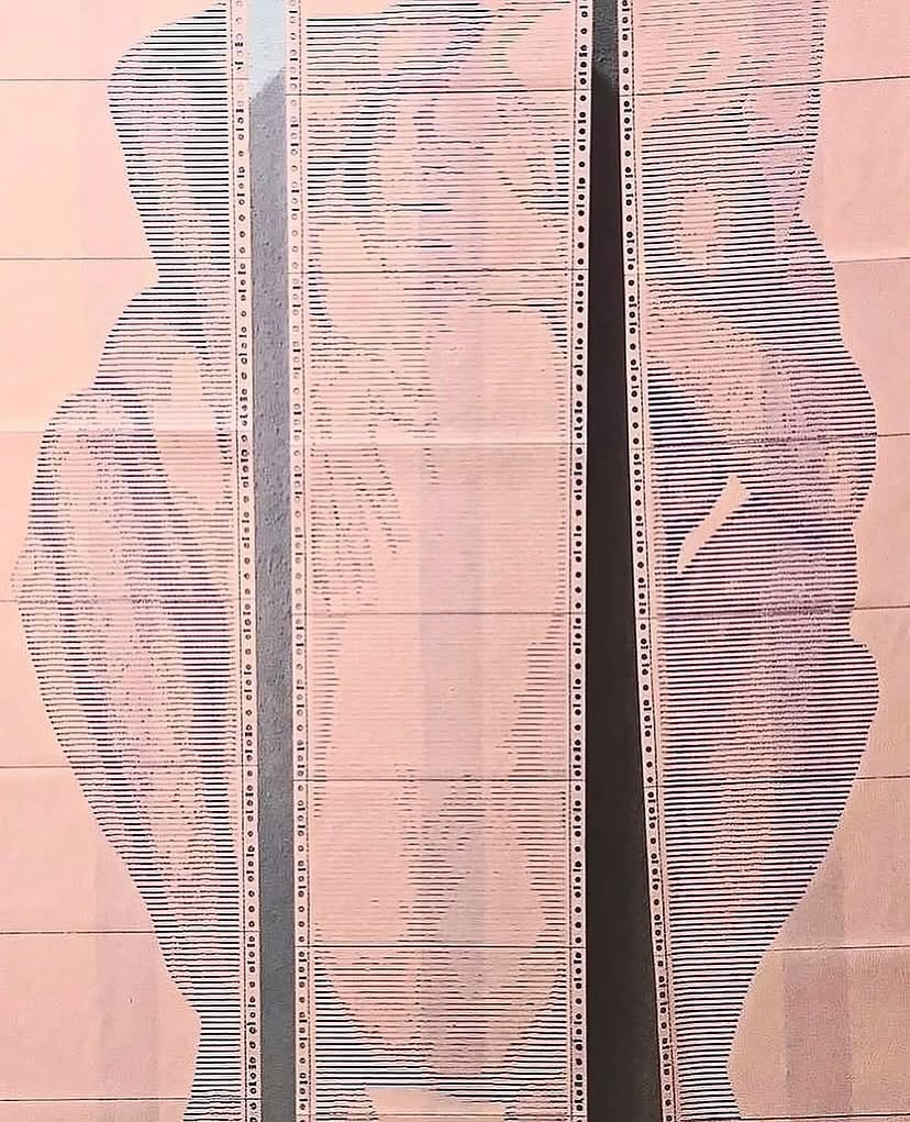 SAFE MODE by CHARACTERS — close-up of ASCII character grid on dot-matrix paper, Blush colorway, showing two male figures in full embrace rendered in monospaced characters. Impact printing on deadstock continuous-feed stock.