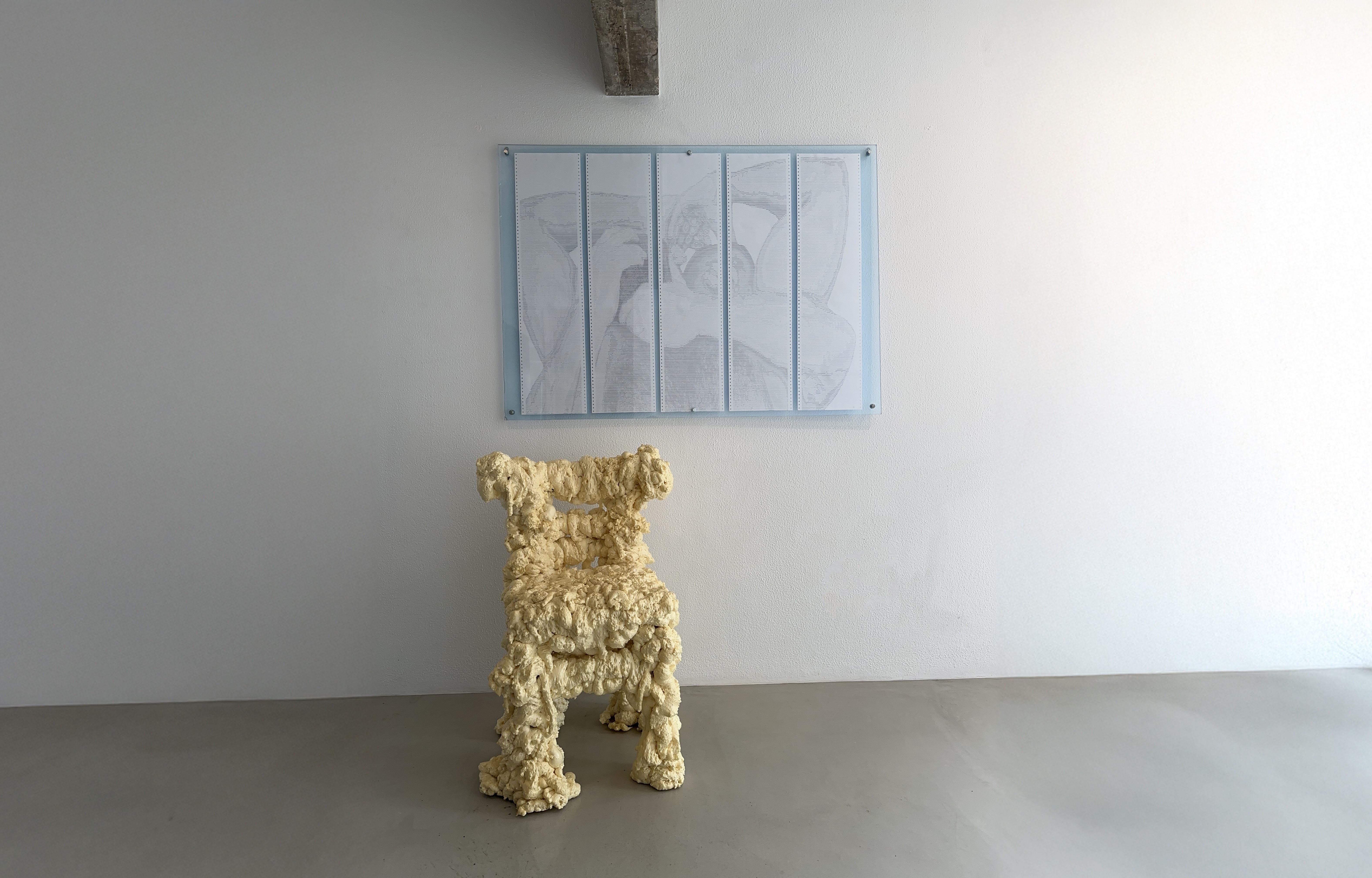 SUBMISSION FORMAT by CHARACTERS — five-sheet ASCII scroll, 120 × 97 cm, framed and installed on wall. Dot-matrix impact print on deadstock continuous-feed paper, 2025.