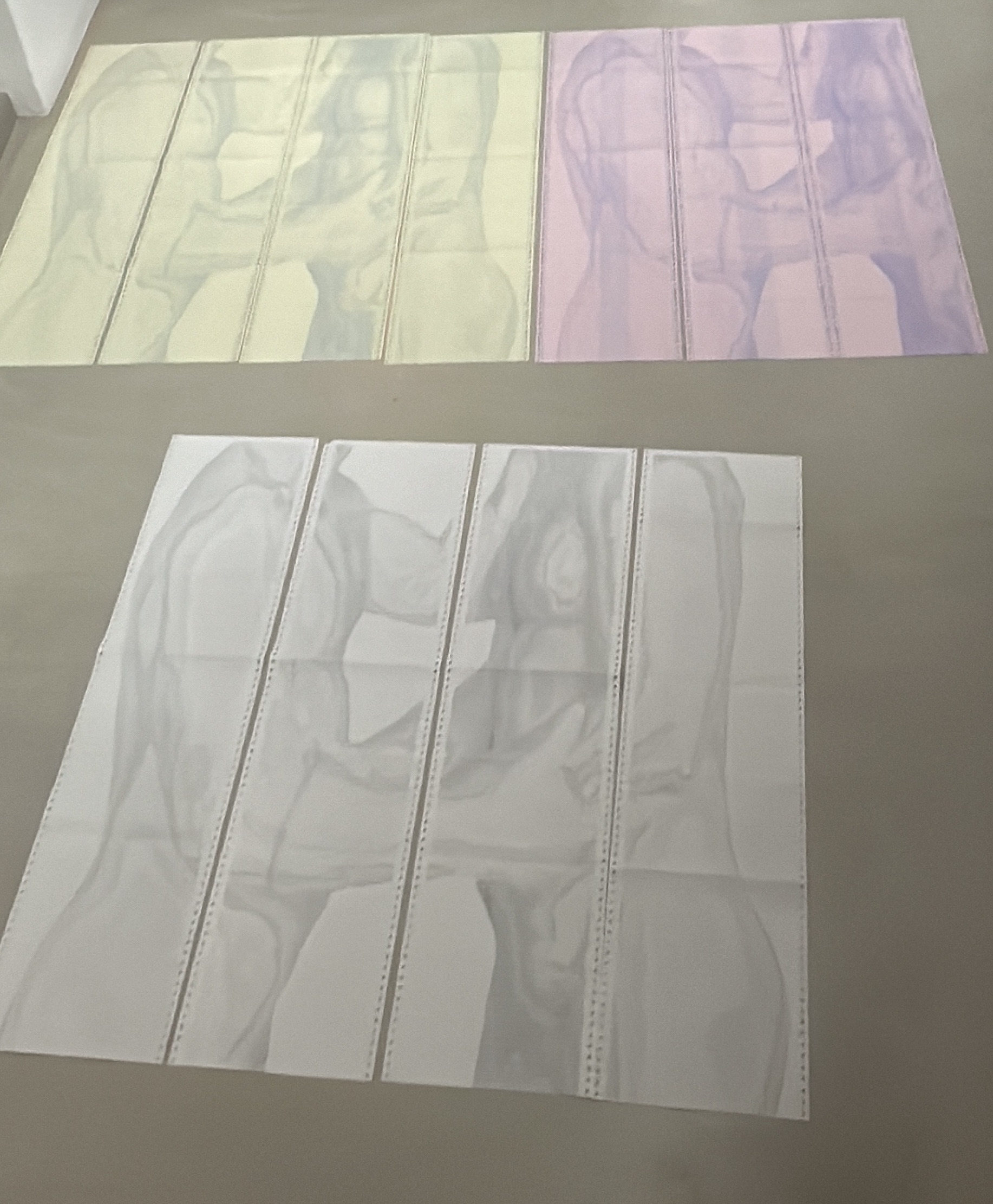 (TXT)TOUCH by CHARACTERS — three colorway variations of the four-sheet ASCII scroll shown side by side: Ecru, Yellow, and Blush. Dot-matrix print on continuous-feed paper, 96 × 96 cm. 2025.